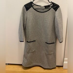 Grey dress with black details. Size M‎